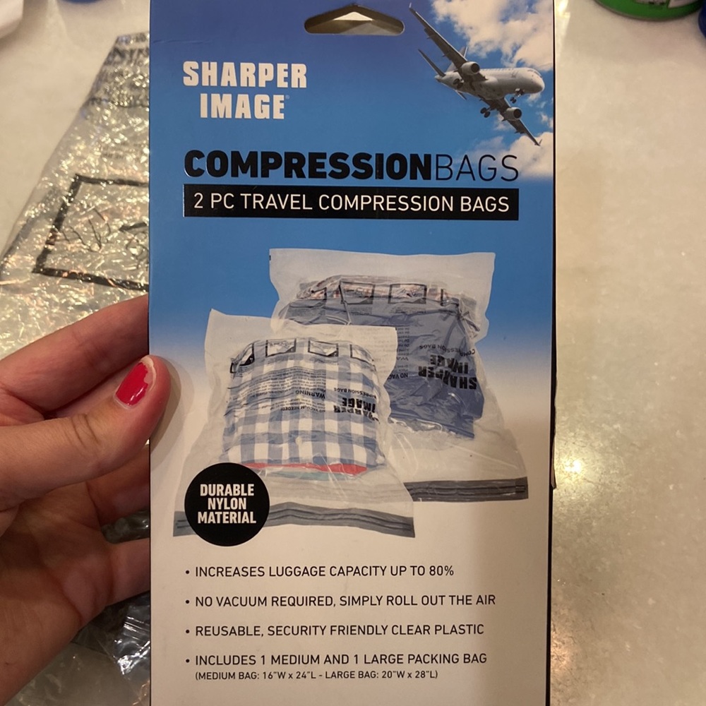 New in box + 1 bonus sharper image 2-piece compression bags